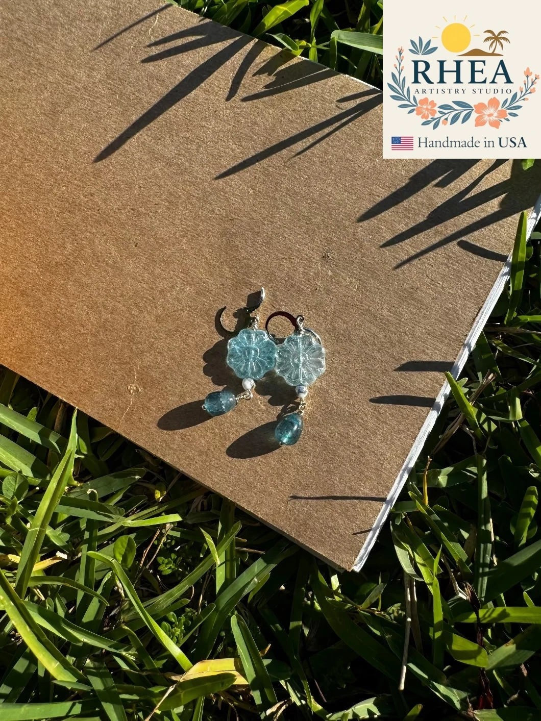 Rhea Artistry Studio blue Czech glass flower drop earrings with surgical stainless steel French lever backs.