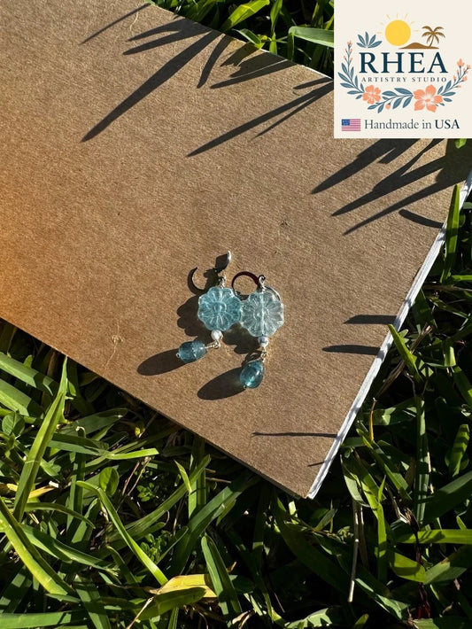 Rhea Artistry Studio blue Czech glass flower drop earrings with surgical stainless steel French lever backs.