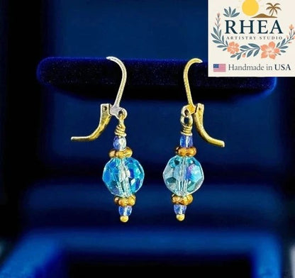 Rhea Artistry Studio blue Czech glass bead earrings with crystal accents and brass hardware, approx. 1.5-2 inches long.
