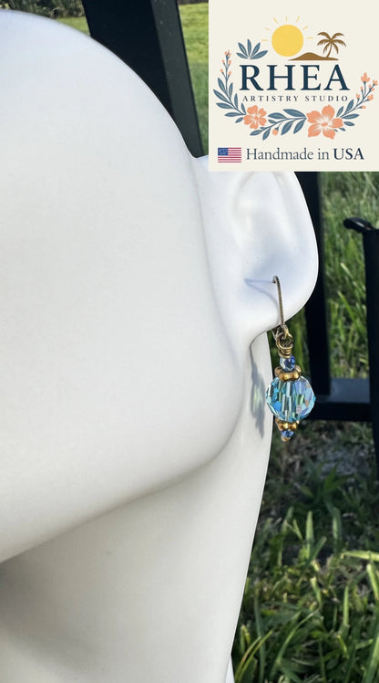 Rhea Artistry Studio blue Czech glass bead earrings with crystal accents and brass hardware, approx. 1.5-2 inches long.