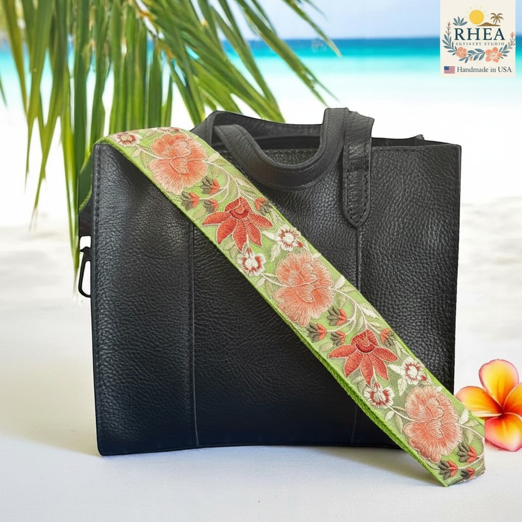 Rhea Artistry Studio lime green crossbody strap with coral and white floral embroidery, 2-inch width, adjustable length.
