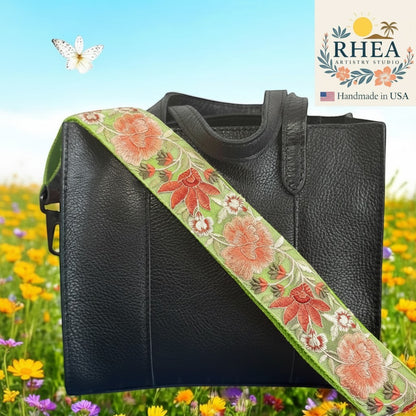 Rhea Artistry Studio green crossbody strap with coral floral embroidery, 2-inch width, adjustable length.