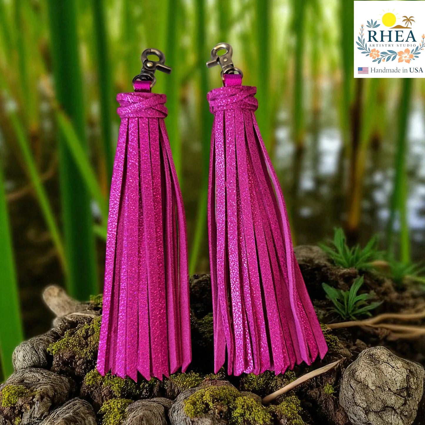 Rhea Artistry Studio handmade fuchsia glitter leather tassel keychain with lobster clasp, 7.25" long.