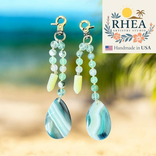 Rhea Artistry Studio Atlantic Haze double-strand gemstone charm with agate, quartz, and jade beads and antique brass clasp.