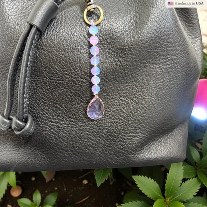 Rhea Artistry Studio handmade pastel gemstone and glass beaded bag charm with a teardrop pendant.