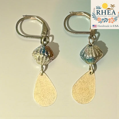Rhea Artistry Studio handcrafted drop earrings with faceted glass beads and brushed brass teardrop charms, approx. 2 inches long.