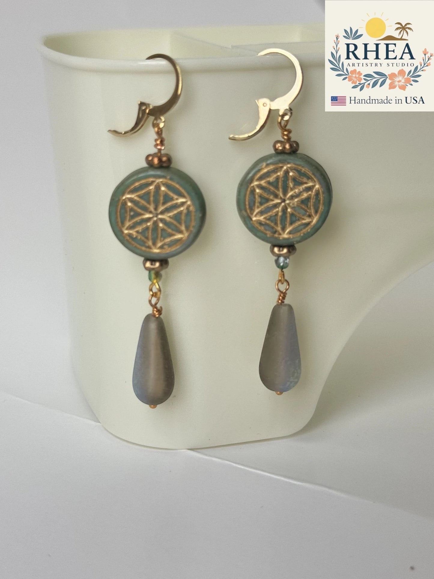 Rhea Artistry Studio green coin of life drop earrings with gold plated brass findings and Czech glass beads.