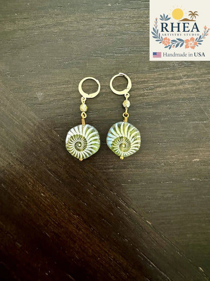Rhea Artistry Studio handmade 1-inch drop earrings with laser-etched avocado green Czech glass beads and 24k gold plated brass lever backs.