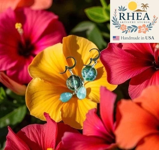 Rhea Artistry Studio light blue hibiscus earrings with Czech glass and gemstone accents, 1.35 inch drop length.