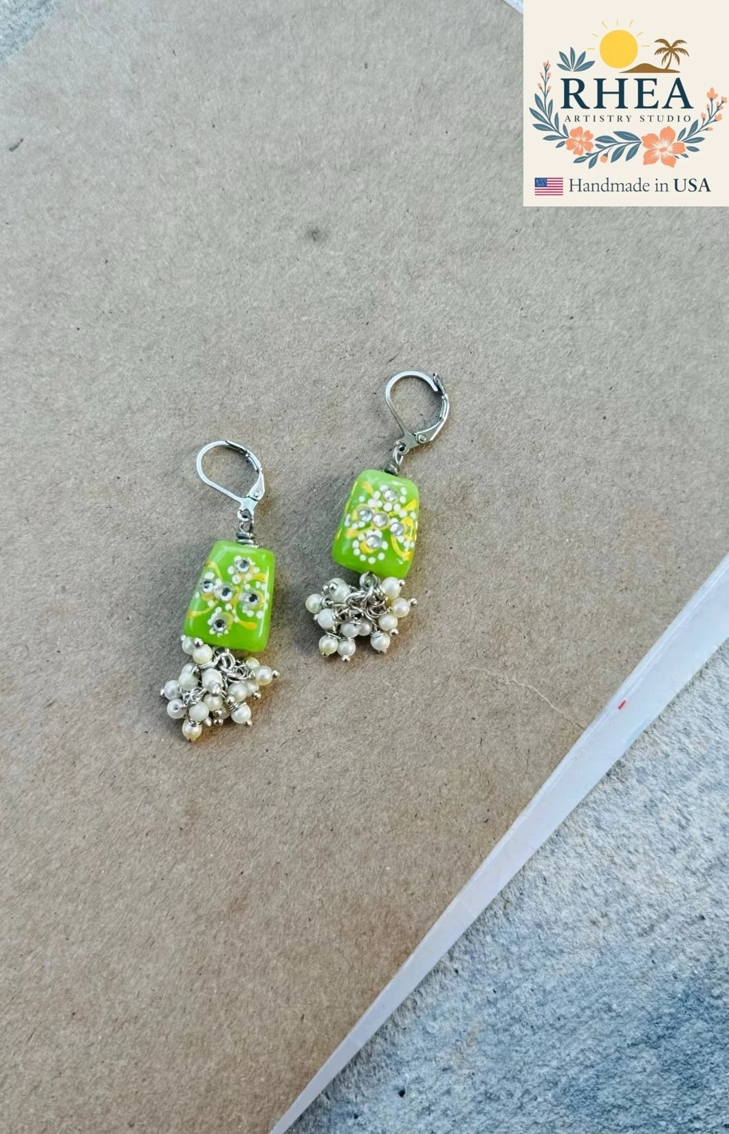 Rhea Artistry Studio lime green hand-painted glass bead earrings with pearl clusters and silver lever backs.