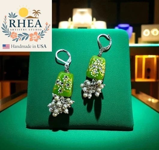 Rhea Artistry Studio lime green glass earrings with pearl clusters and silver lever backs. Hand-painted floral details.