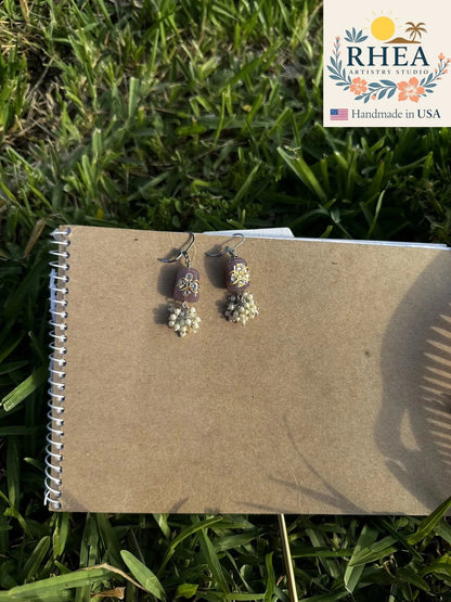Rhea Artistry Studio mauve pearl cluster silver earrings with French lever backs and hand-painted glass bead detail.