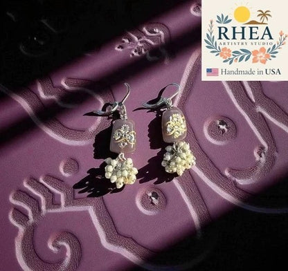 Rhea Artistry Studio mauve pearl cluster silver earrings with French lever backs and hand-painted glass bead detail.