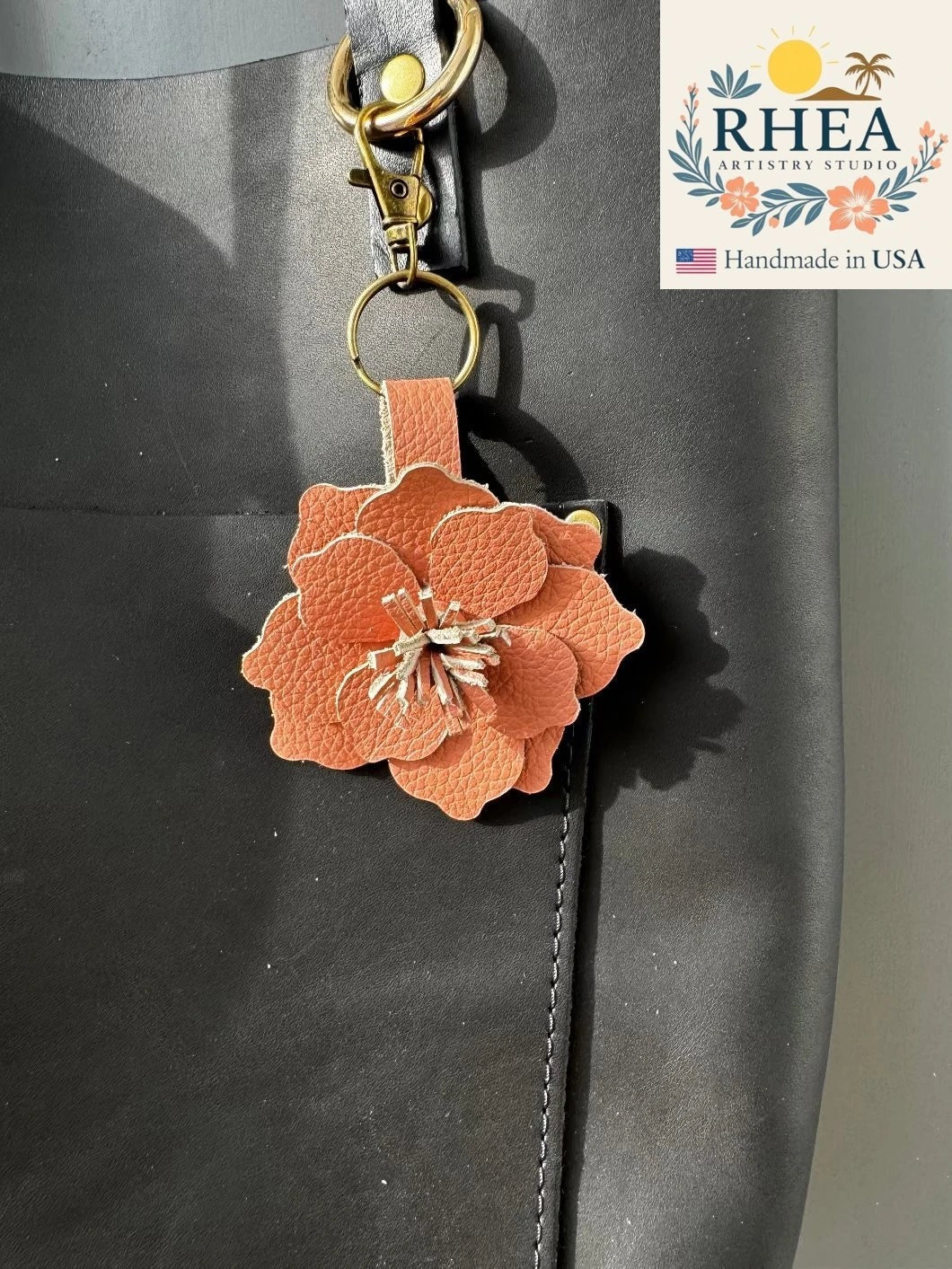 Rhea Artistry Studio peach leather flower charm with tan and pink hues, featuring a lobster clasp and split ring.