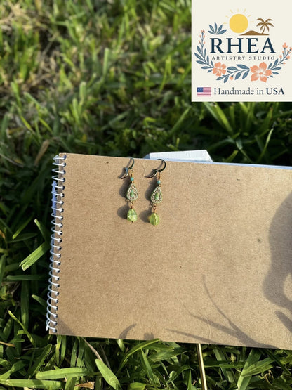 Rhea Artistry Studio Picasso green Czech glass drop earrings with 24k gold plated brass findings and French lever back closures.