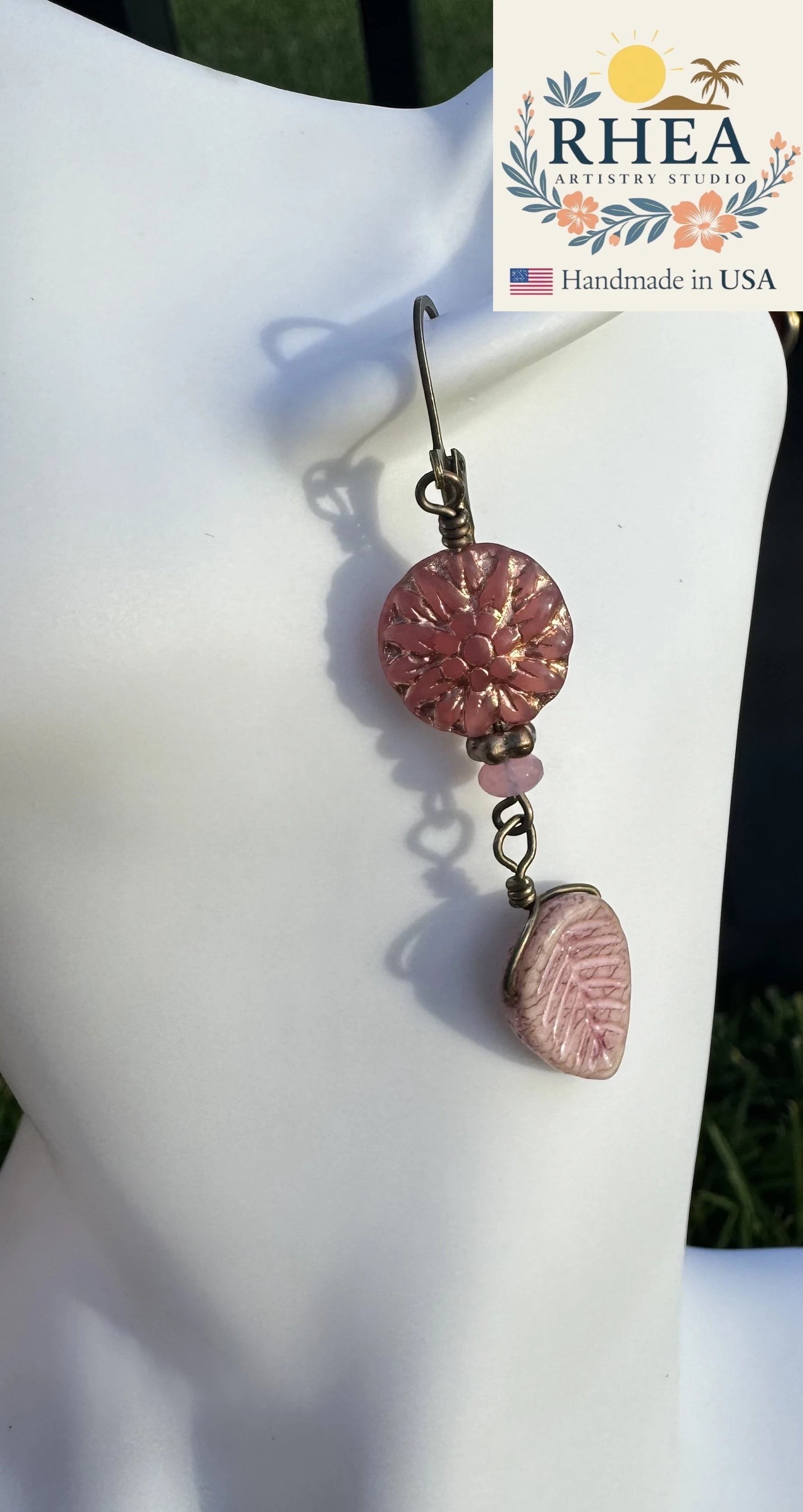Rhea Artistry Studio pink dahlia leafy drop earrings with brass hardware, approx. 2 inches long.