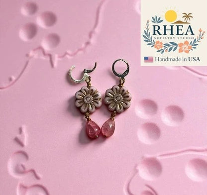 Rhea Artistry Studio pale pink floral Czech glass earrings with gold wash and pink gemstone drops.