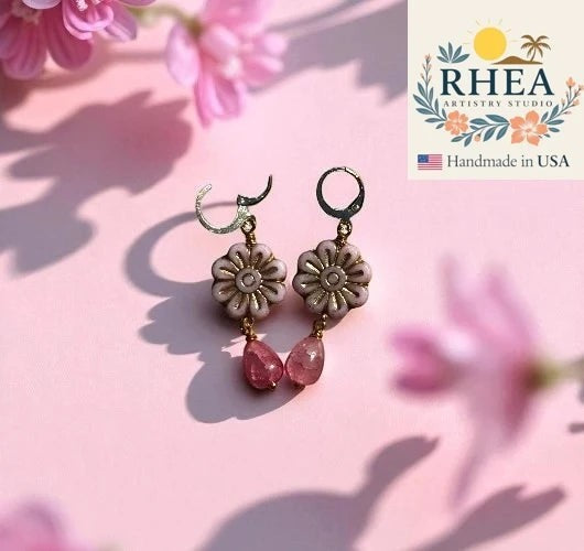 Rhea Artistry Studio pale pink Czech glass floral earrings with gold wash and pink gemstone drops.