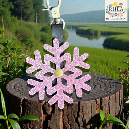 Rhea Artistry Studio pink glitter snowflake leather mini charm with brass accent, handmade in USA.