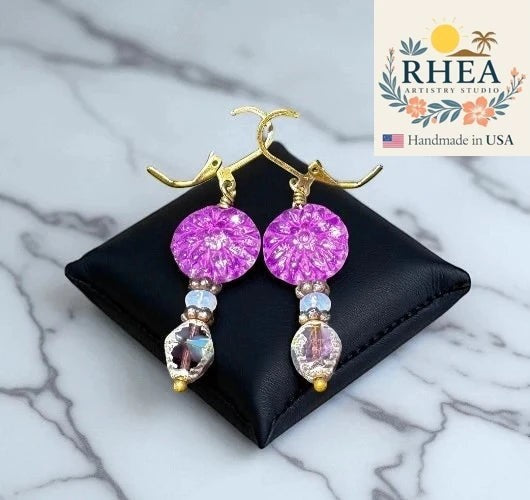 Rhea Artistry Studio purple dahlia glass earrings with lavender beads and brass hardware, approx. 1.5-2 inches long.