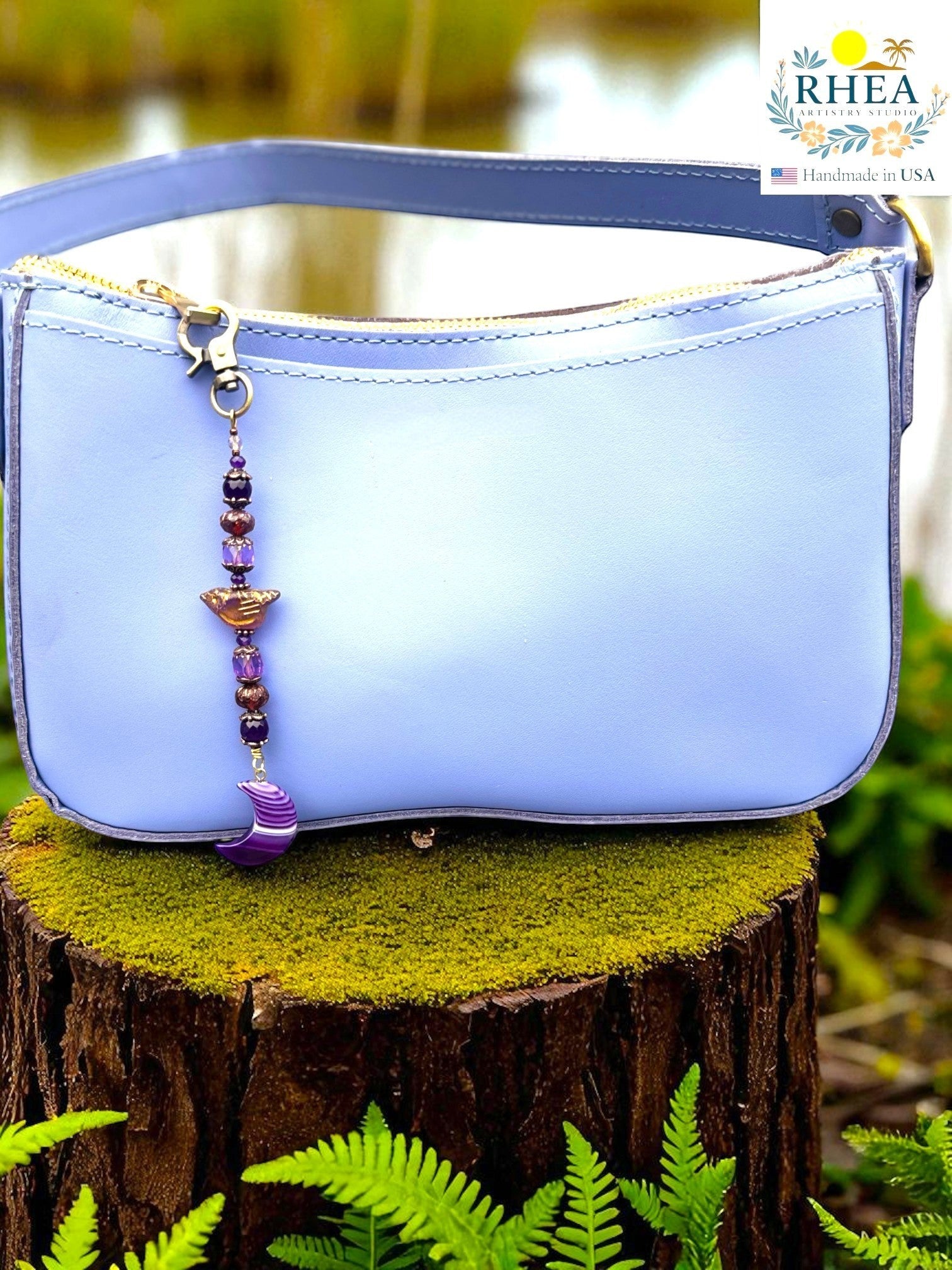 Rhea Artistry Studio purple gemstone and Czech bead bag charm with crescent moon pendant and brass clasp.