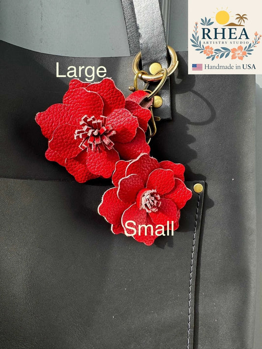 Rhea Artistry Studio red leather flower charm with unique hand-cut stamens and lobster clasp.