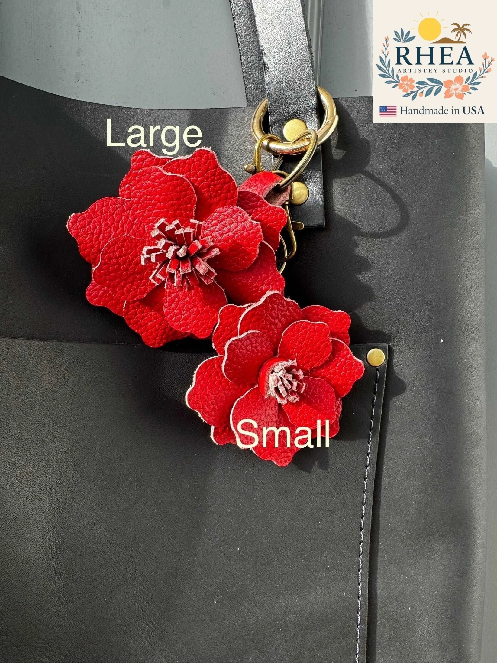 Rhea Artistry Studio red leather flower charm with detailed petals and a textured center, featuring a lobster clasp and split ring for versatile attachment.