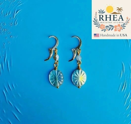 Rhea Artistry Studio Starburst oval blue Czech glass earrings with 24k gold plated brass findings and French lever backs.