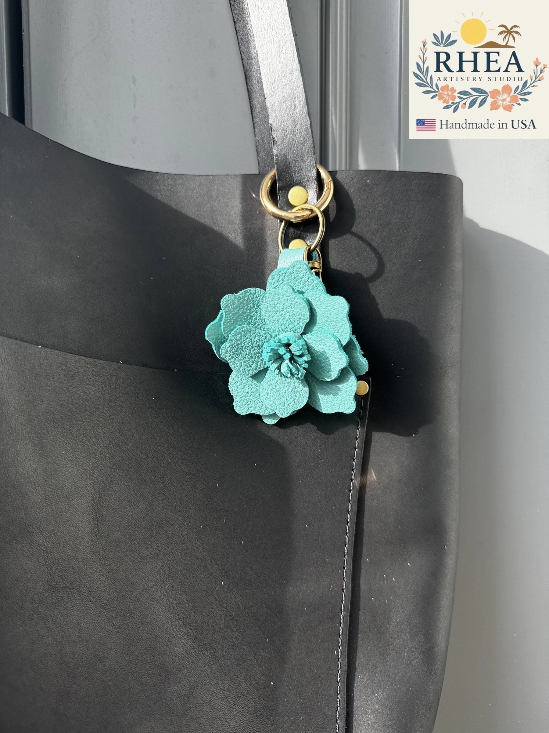 Rhea Artistry Studio teal leather flower charm with lobster clasp and split ring, 2.5 inches, handmade in USA.