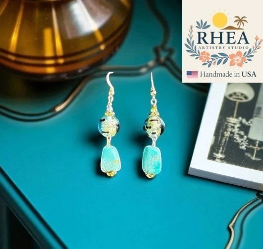 Rhea Artistry Studio turquoise lamp glass drop earrings with 14k gold filled fish hook findings, approx. 1.5 inches long.
