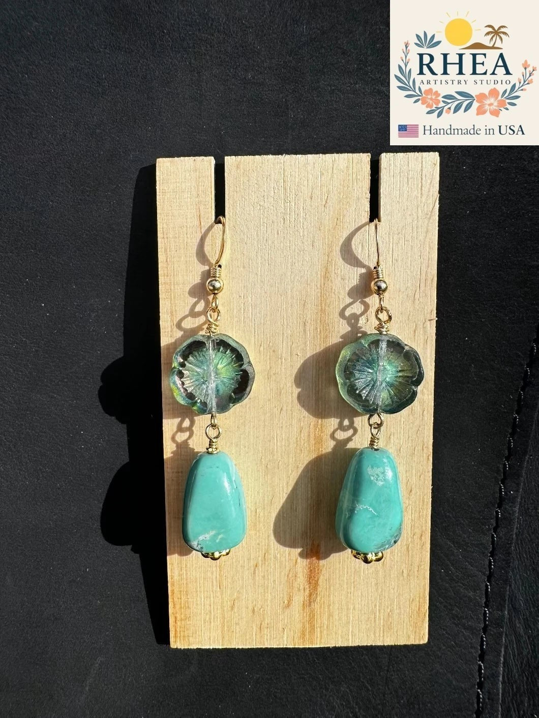 Rhea Artistry Studio turquoise and green hibiscus glass drop earrings with 14k gold filled fish hook findings.