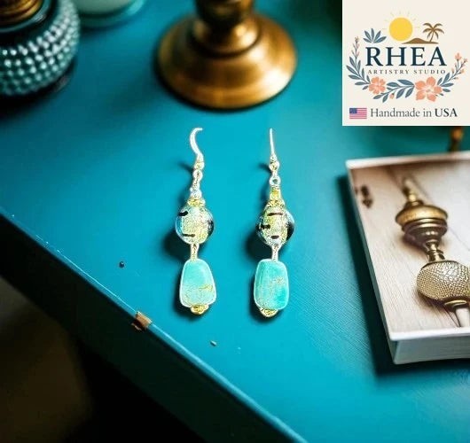 Rhea Artistry Studio turquoise lamp glass drop earrings with 14k gold filled fish hook findings, approx. 1.5 inches long.