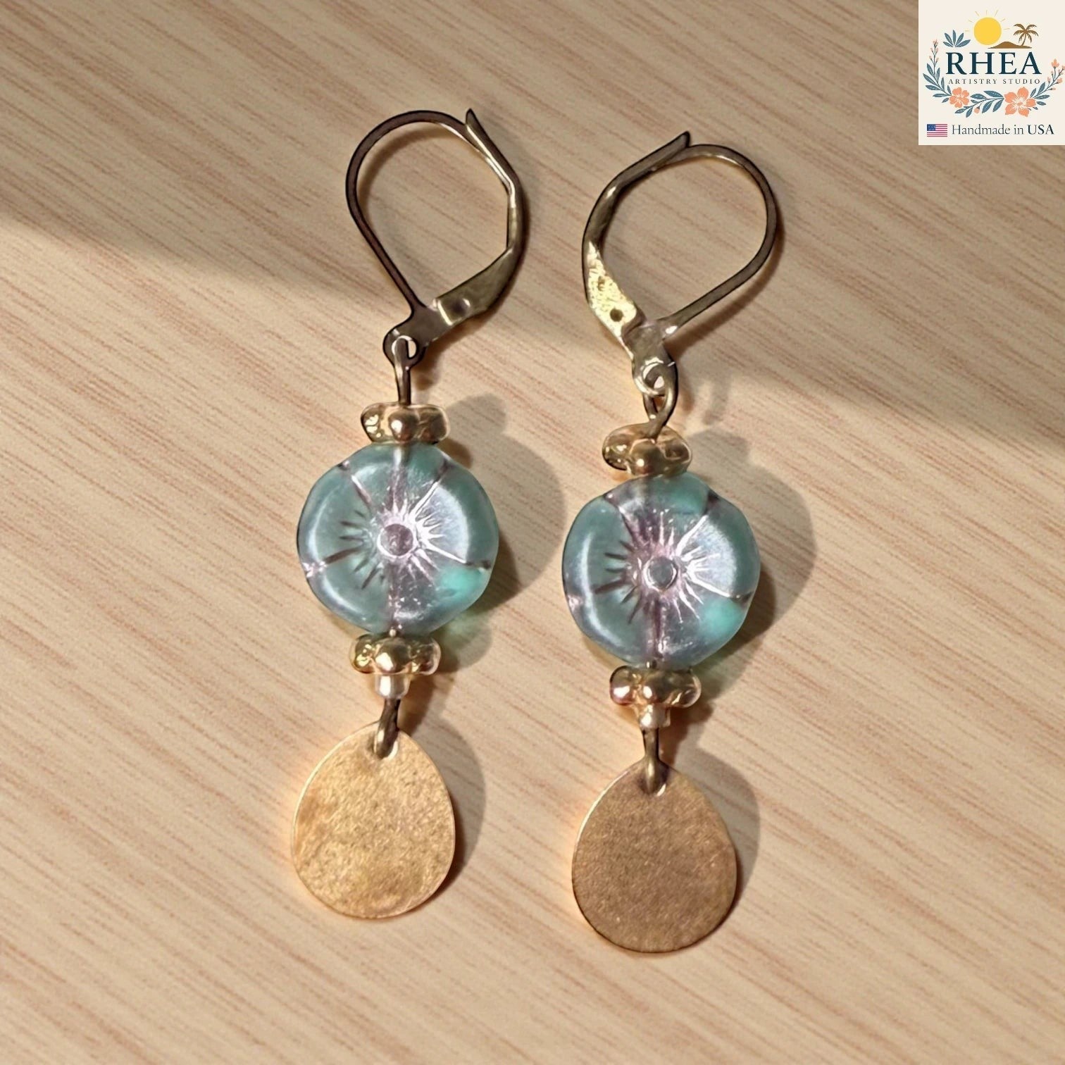 Lightweight handmade earrings with premium materials and secure hooks in brass accents and green