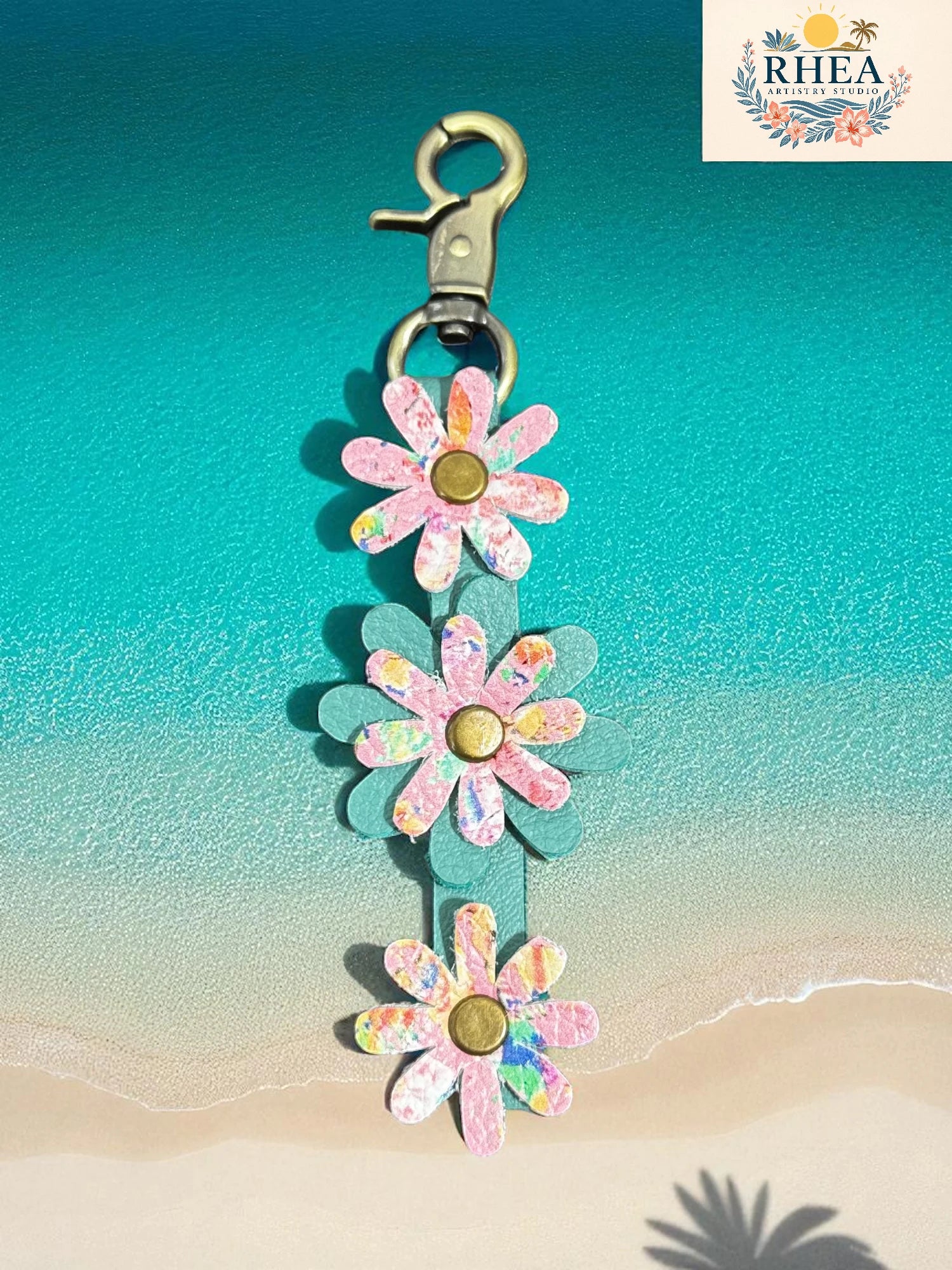 Floral keychain with a beach background