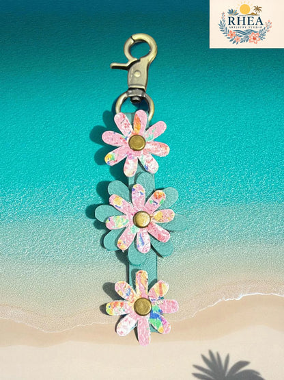 Floral keychain with a beach background