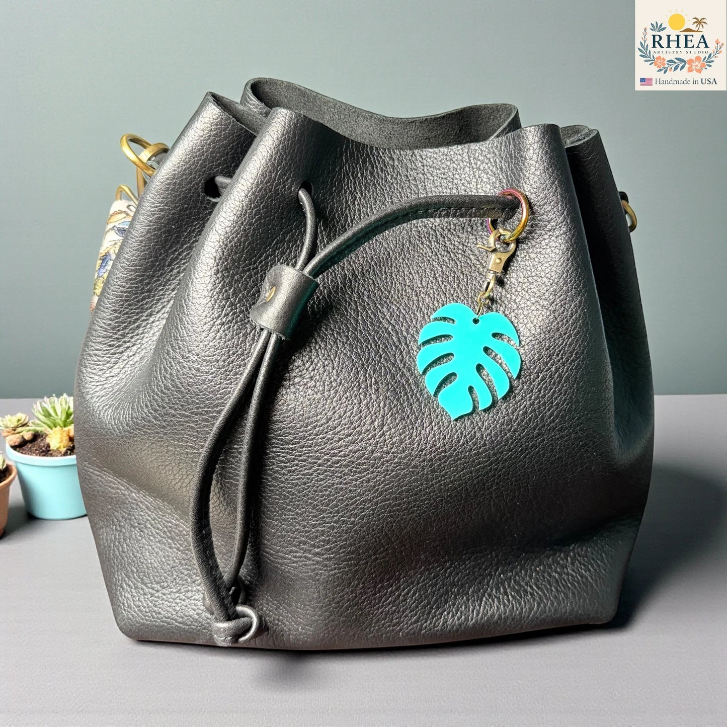 Mini acrylic monstera bag charm with antique brass clasp