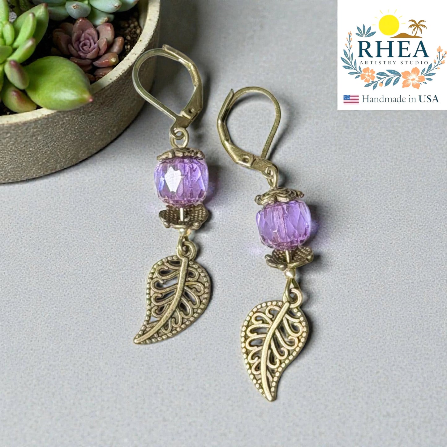 Handmade leaf drop earrings with faceted glass and antique brass